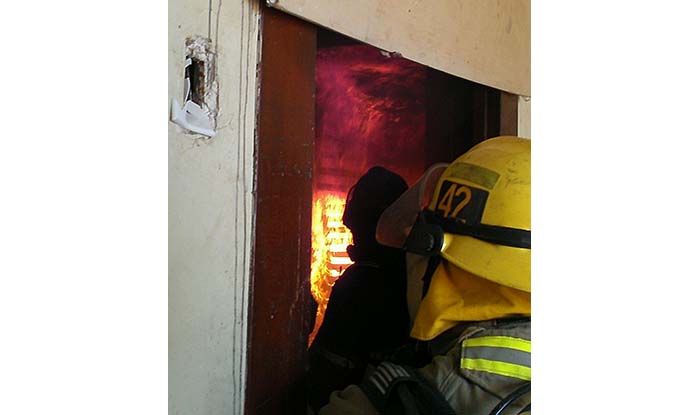 Firefighters entering Burning Building