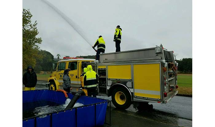 Firefighters on Fire Engine